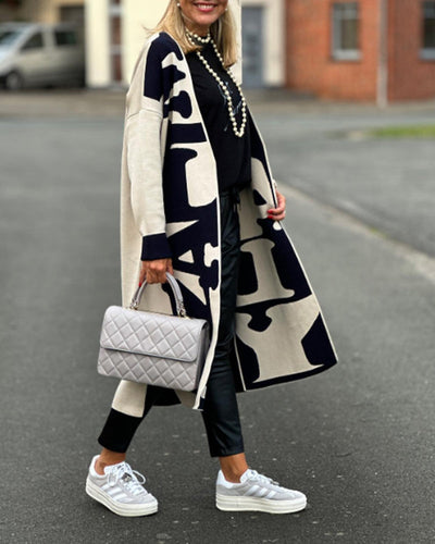 Heidi-Mode | Lockere Strickjacke Kontrastfarben Schwarz und Weiß