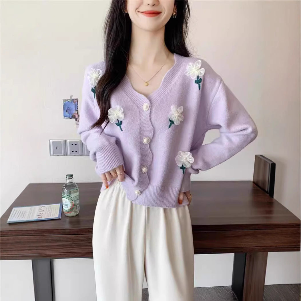 Damen Strickjacke mit floralem Design und eleganten Perlenknöpfen Heidi-Mode