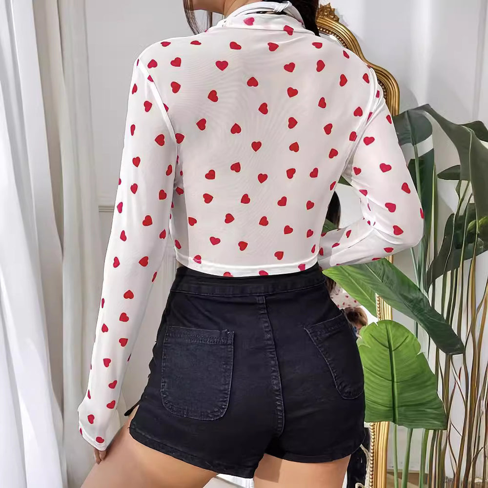 Damen Langarm-Crop-Top mit herzförmigem Design und transparentem Stoff Heidi-Mode