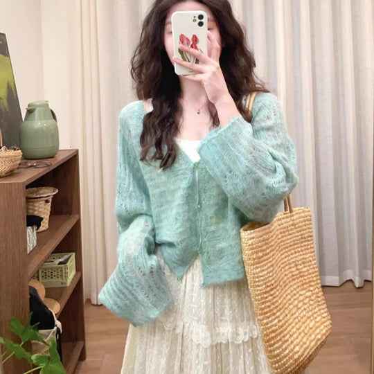 Damen luftiger Strickcardigan mit feiner Lochmusterstruktur und weitem Schnitt Heidi-Mode