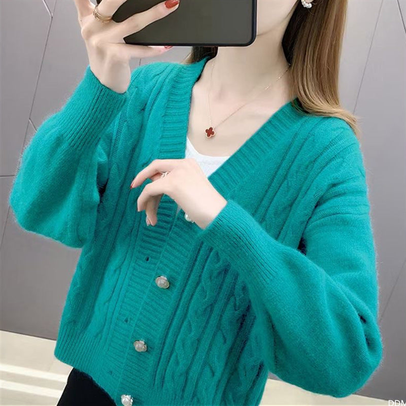 Damen Strickjacke mit elegantem Zopfmuster und hochwertigen Knopfdetails Heidi-Mode