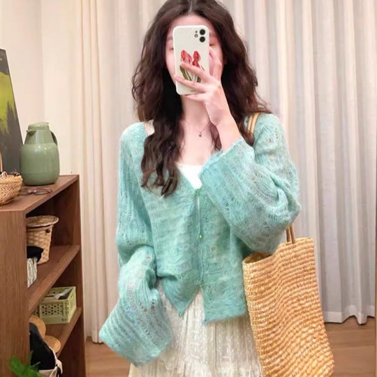 Damen luftiger Strickcardigan mit feiner Lochmusterstruktur und weitem Schnitt Heidi-Mode