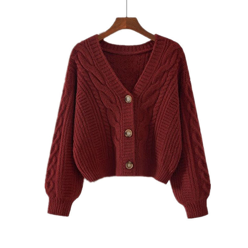 Damen Strickjacke mit ausgefallenem Zopfmuster und tiefem V-Ausschnitt Heidi-Mode