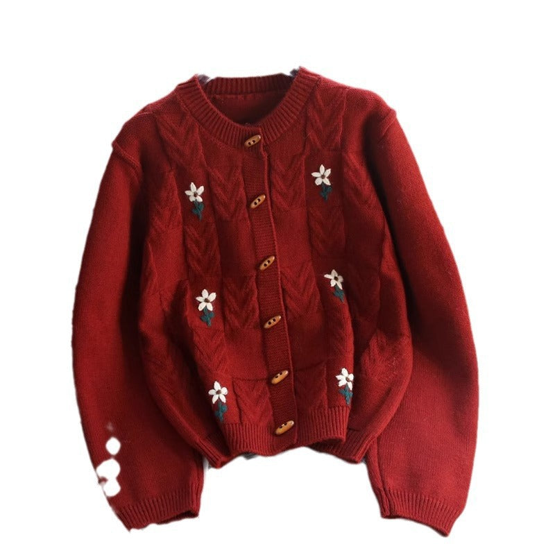 Damen Strickjacke mit floralem Zopfmuster und Holzknöpfen Heidi-Mode
