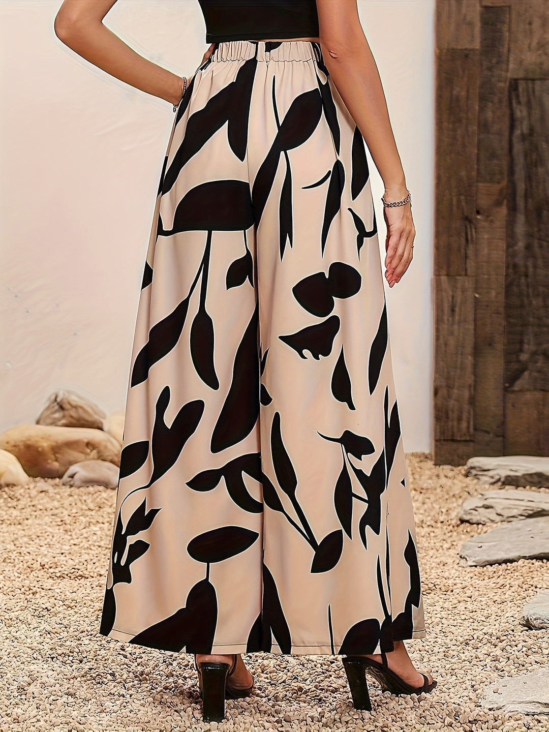 Damen Palazzo-Hose mit floralem Muster und weitem Schnitt Heidi-Mode
