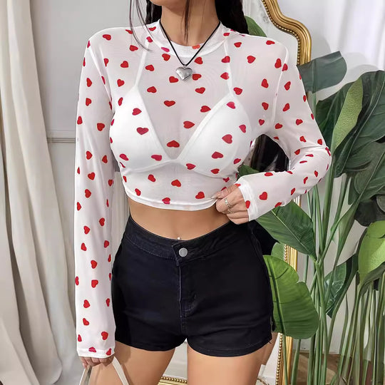 Damen Langarm-Crop-Top mit herzförmigem Design und transparentem Stoff Heidi-Mode