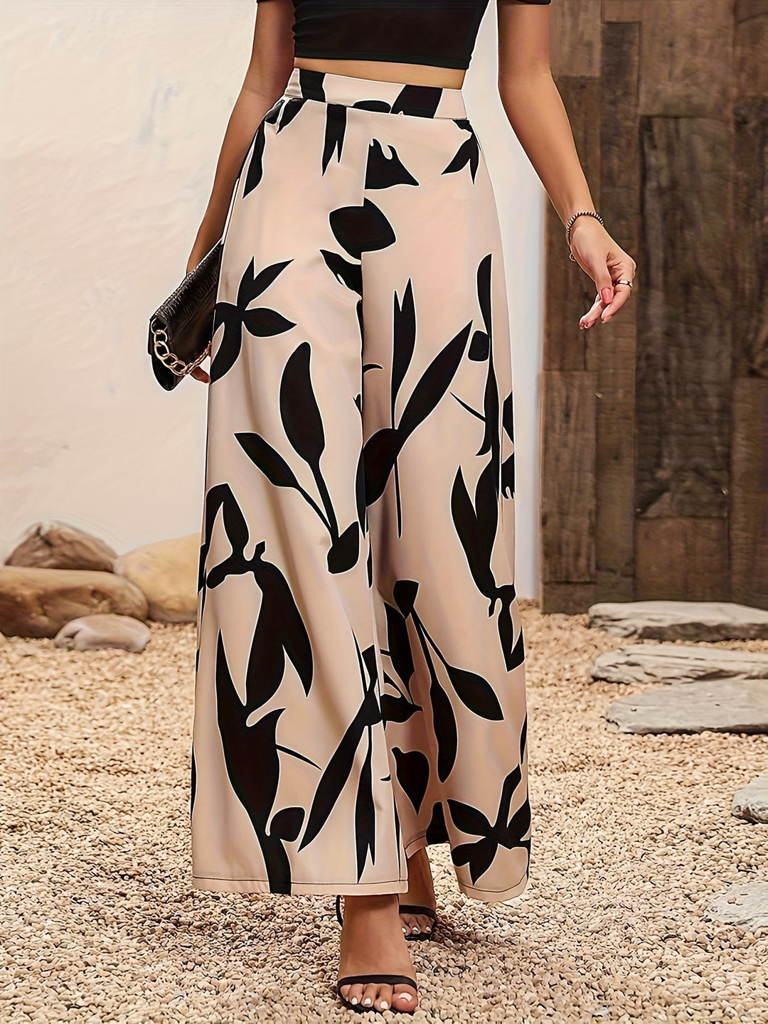 Damen Palazzo-Hose mit floralem Muster und weitem Schnitt Heidi-Mode