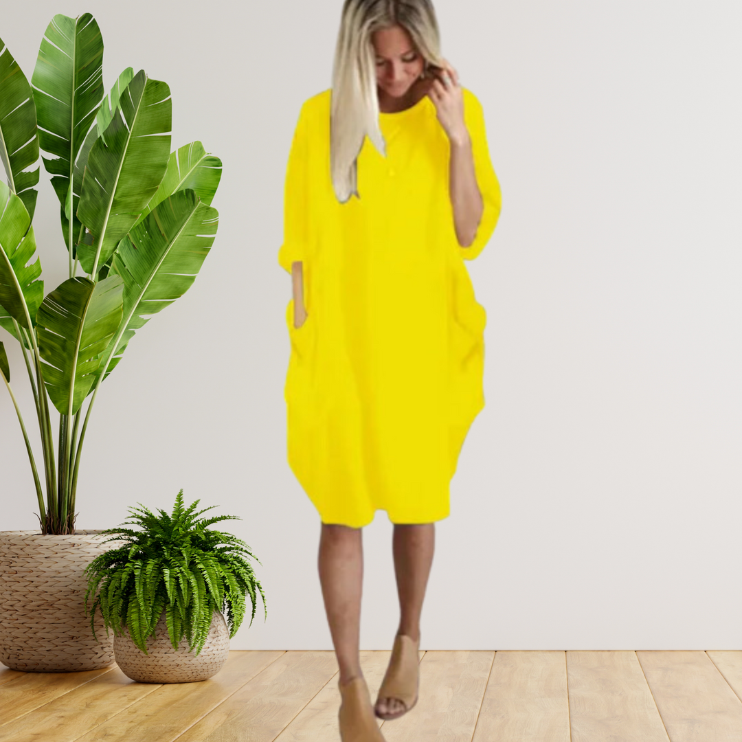 Langärmeliges lockeres Taschenkleid