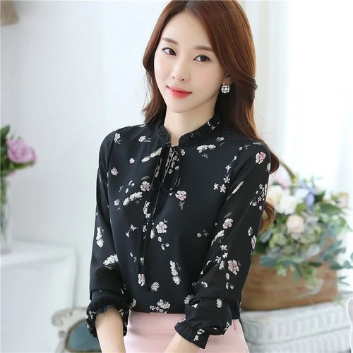 blouse met bloemenpatroon en strikkraag
