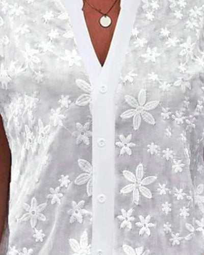 Heidi-Mode | Kurzärmlige Blumenbluse mit V-Ausschnitt