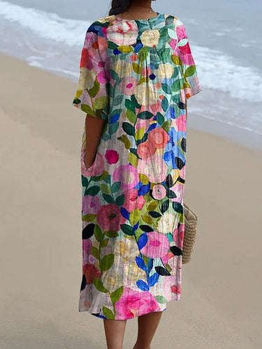 Fließendes Damenkleid mit farbenfrohem Frühlingsblumendruck