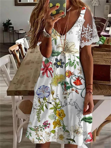 Heidi-Mode | Kleid mit Spitzenärmeln und V-Ausschnitt Print Design