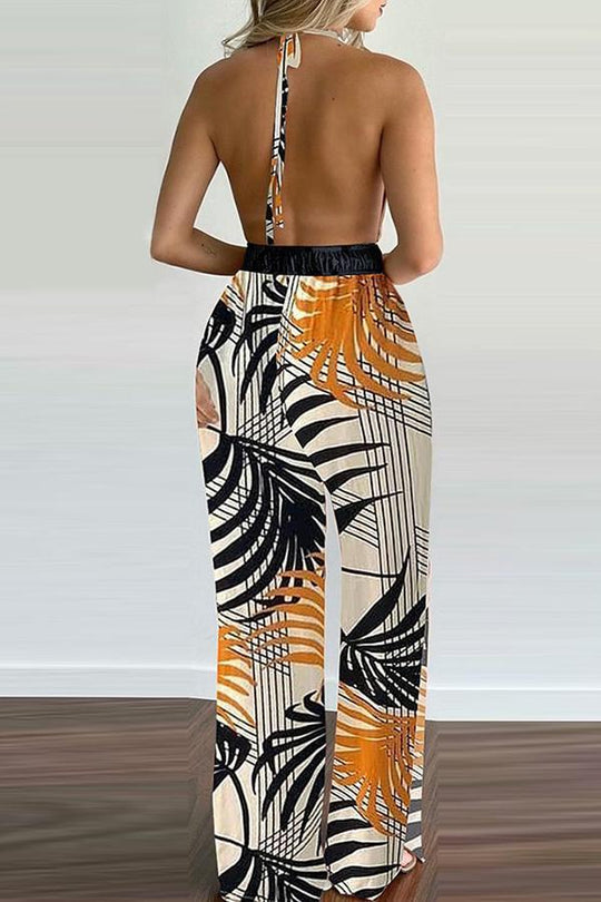 Heidi-Mode | Carneros Floral Print Halter Breite Beine Jumpsuit