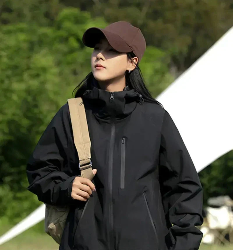 Heidi-Mode - Wasser- und winddichte Damenregenjacke mit Kapuze und Taschen