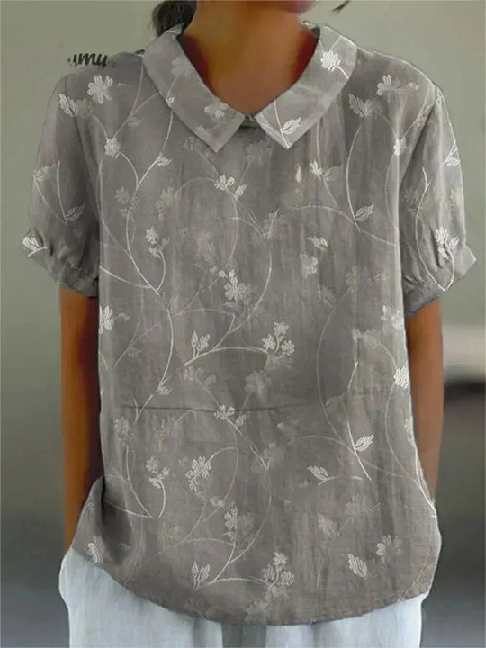 Heidi-Mode | Kurzarm Bluse mit floralem Muster und Kragen