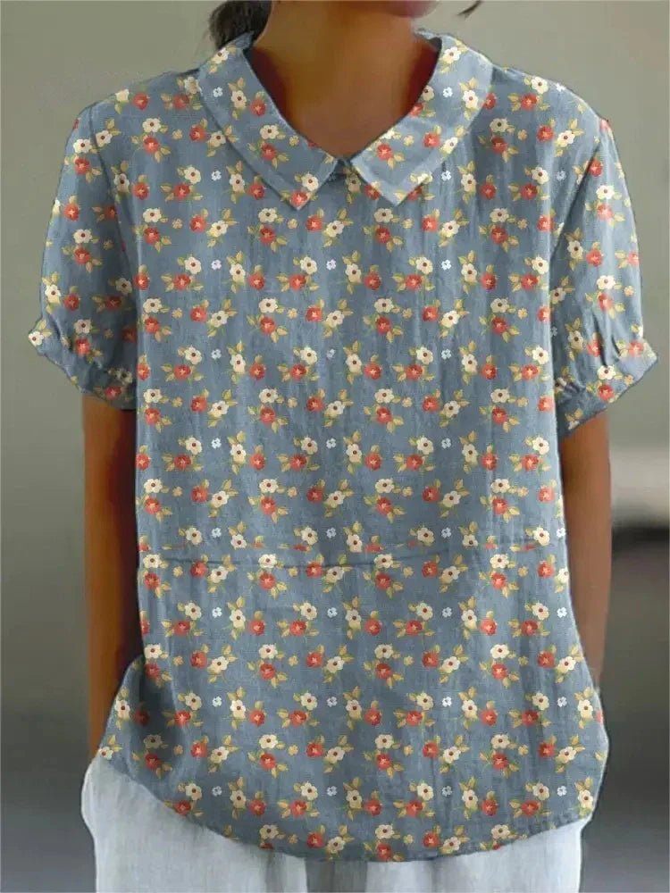 Heidi-Mode | Kurzarm Bluse mit floralem Muster und Kragen