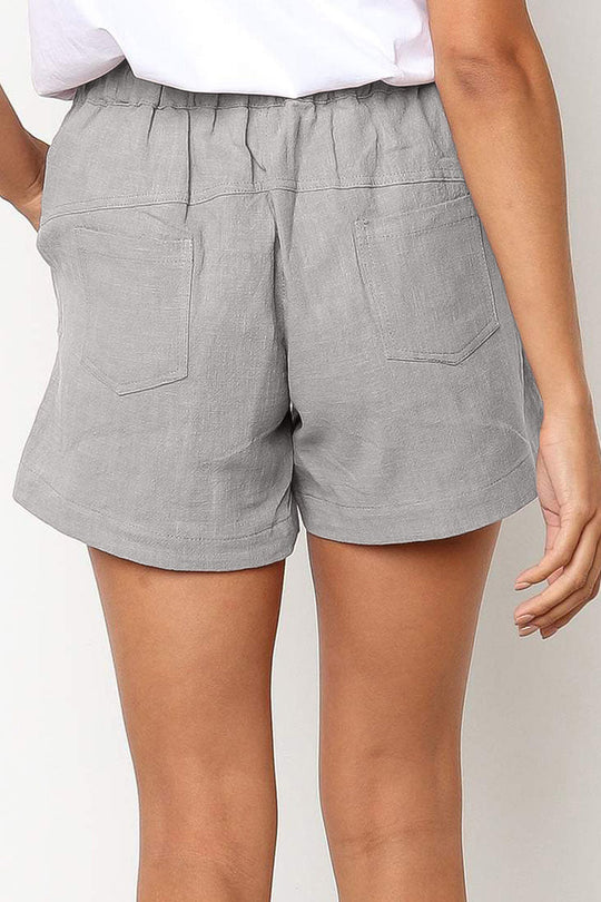 Shorts mit Kordelzug in der Taille und schrägen Taschen