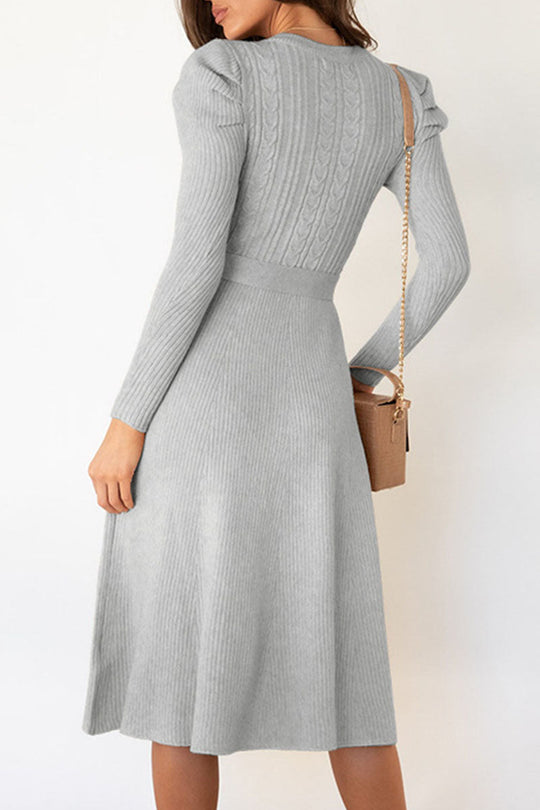 schlank geschnittenes langärmliges gestricktes Schlagrock Maxi Kleid