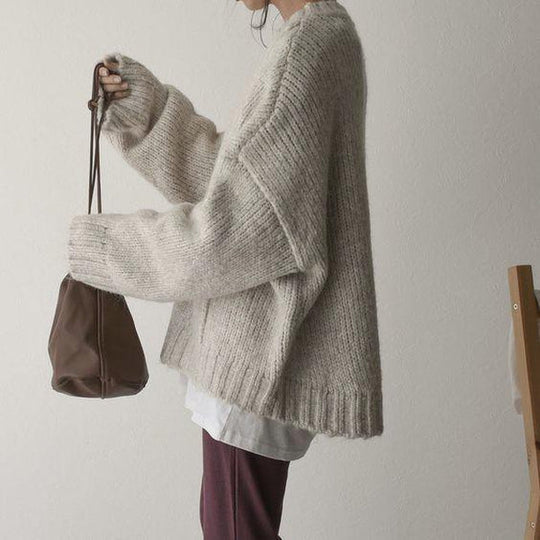 Oversize Pullover mit elfenbeinfarbener Taschenfront