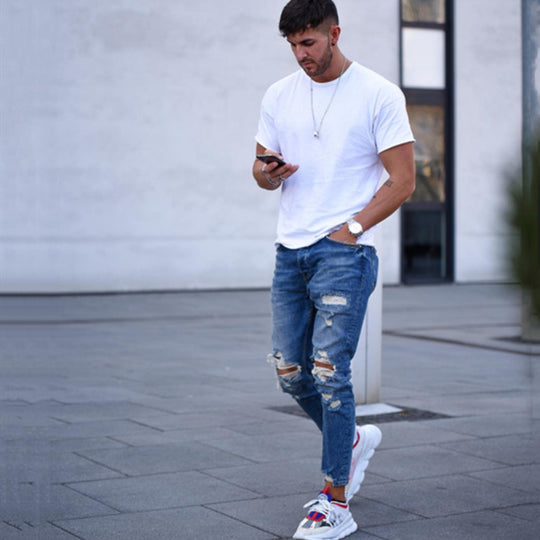 Herren modische Slim Fit Jeans mit angesagten Rissen und Verjüngung Heidi-Mode
