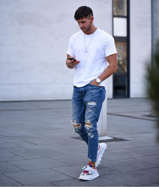 Herren modische Slim Fit Jeans mit angesagten Rissen und Verjüngung Heidi-Mode