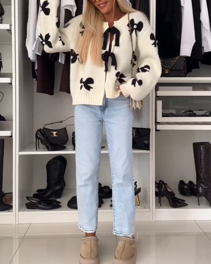 Heidi-Mode | Cardigan mit Schleifenbindung und Schleifenmotiv