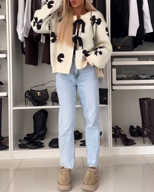 Heidi-Mode | Cardigan mit Schleifenbindung und Schleifenmotiv
