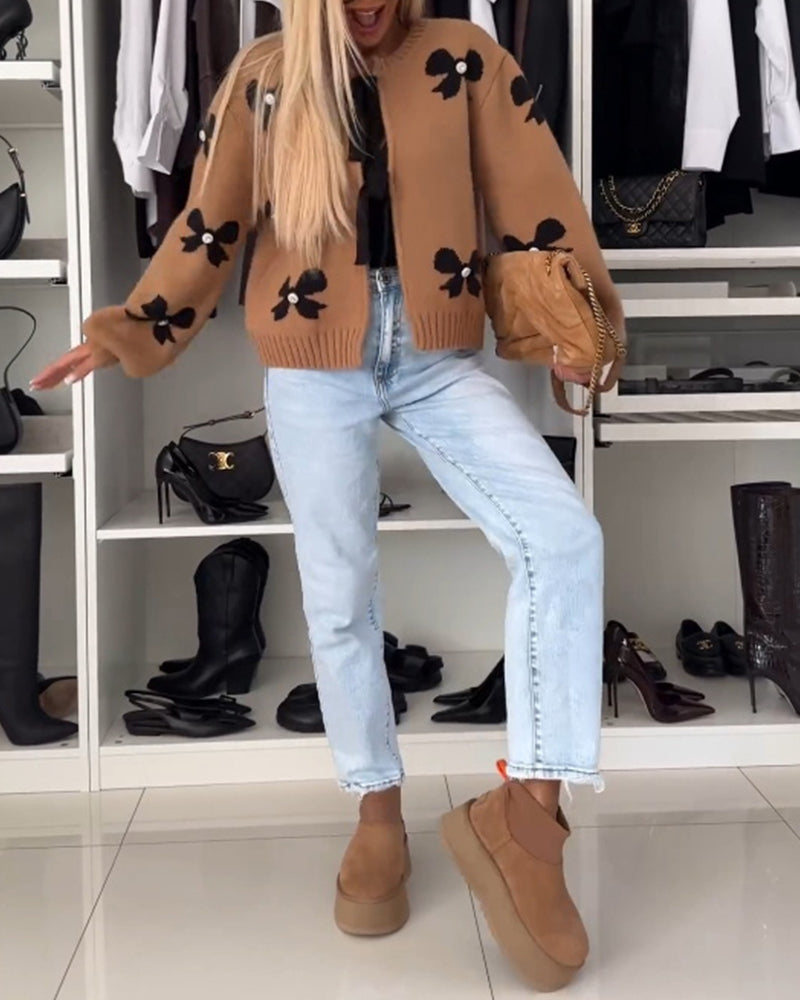 Heidi-Mode | Cardigan mit Schleifenbindung und Schleifenmotiv