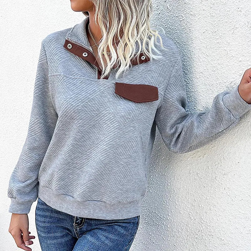 Gestepptes Pullover mit Knopfkragen