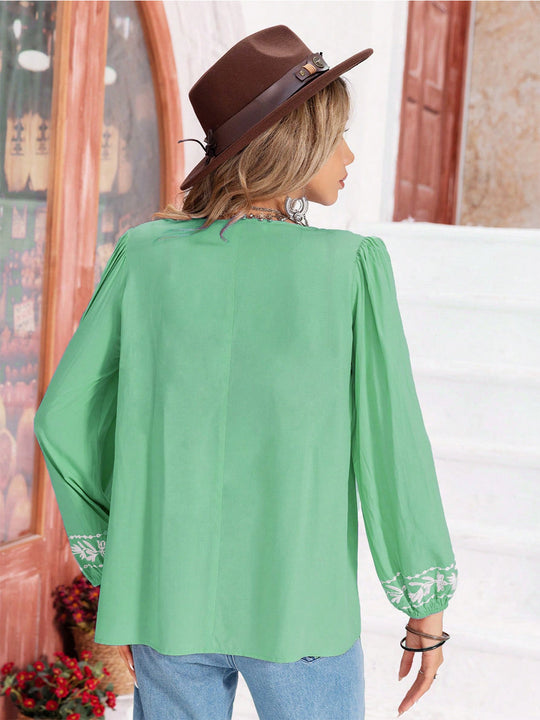 Heidi-Mode | Florale Bindekragen Bluse mit Ballonärmeln