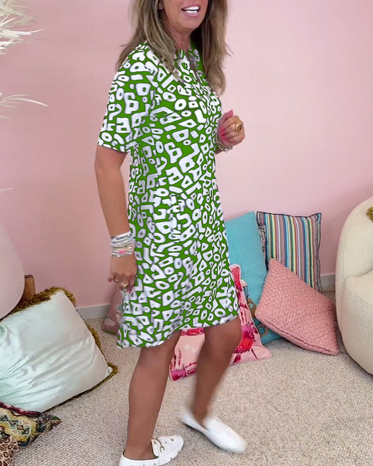 Viaro – Kleid mit Aufdruck, V-Ausschnitt und Taschen