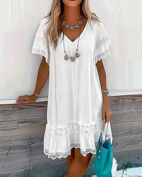 Heidi-Mode | Einfarbiges Kleid mit Kurzen Ärmeln und Spitzeneinsätzen