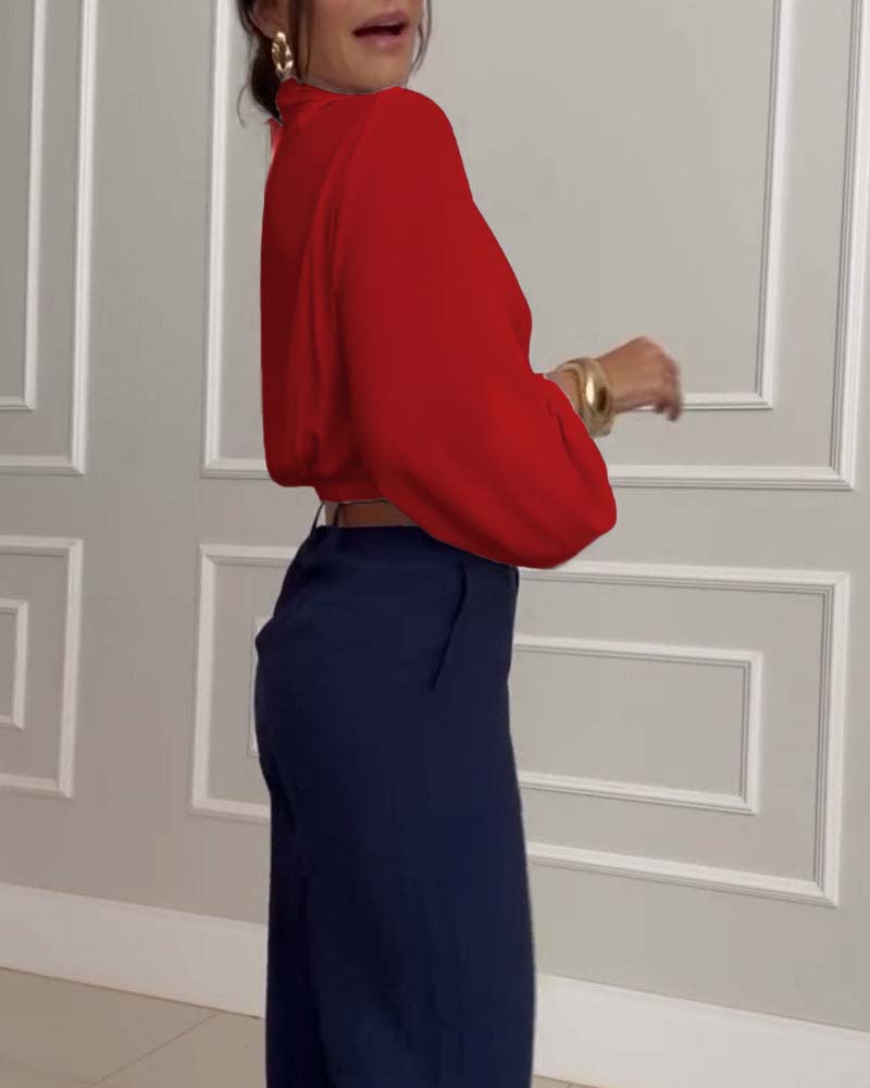 Heidi-Mode | Stilvolle weiße Bluse mit Lampionärmeln und V-Ausschnitt