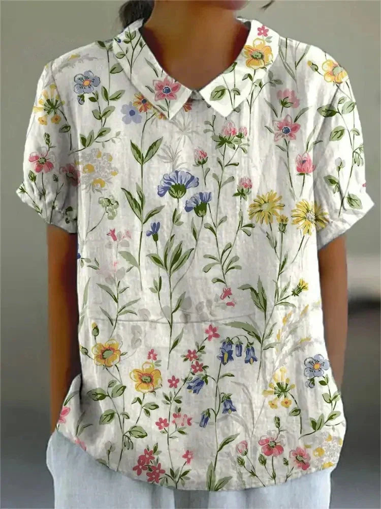 Heidi-Mode | Kurzarm Bluse mit floralem Muster und Kragen