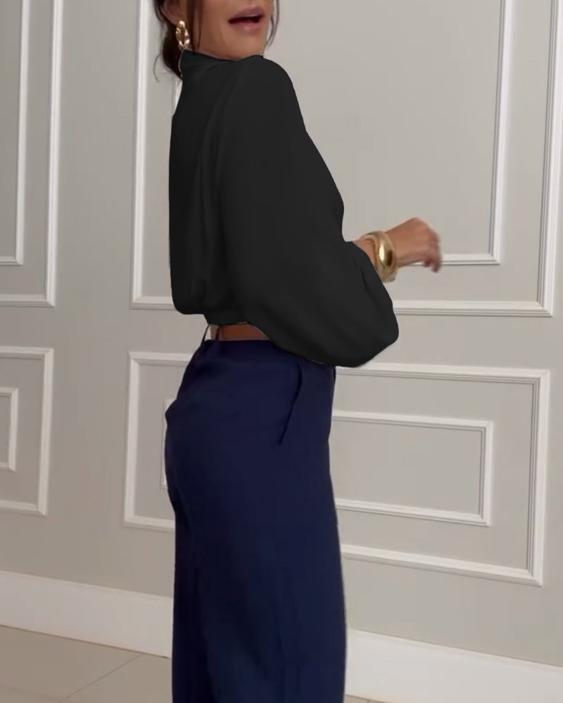 Heidi-Mode | Stilvolle weiße Bluse mit Lampionärmeln und V-Ausschnitt