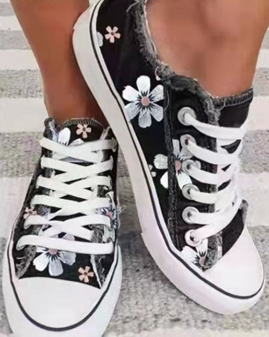 sneaker met bloemen