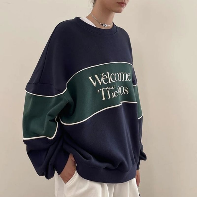 Retro-Sweatshirt mit 'Welcome the 80s' Schriftzug