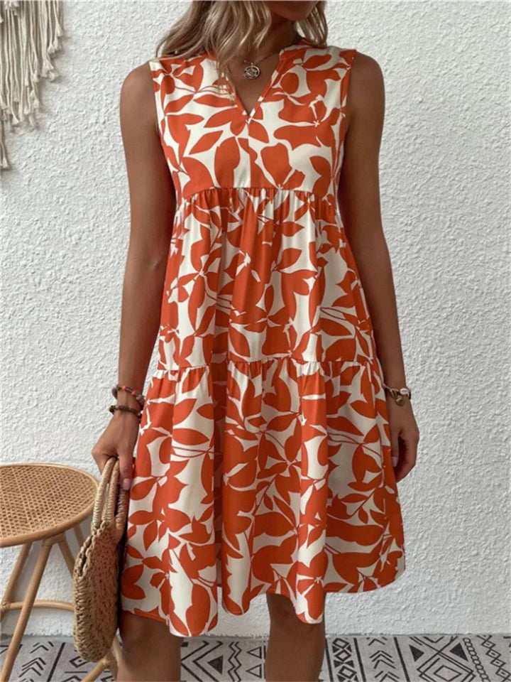 Heidi-Mode | Stilvolle Damenkleid mit Blattmotiv für Den Sommer