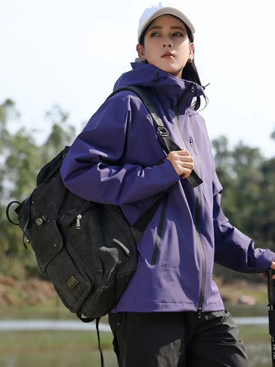 Heidi-Mode - Wasser- und winddichte Damenregenjacke mit Kapuze und Taschen