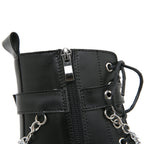 Schwarze Stiefel mit hohen Absätzen im Martens-Stil