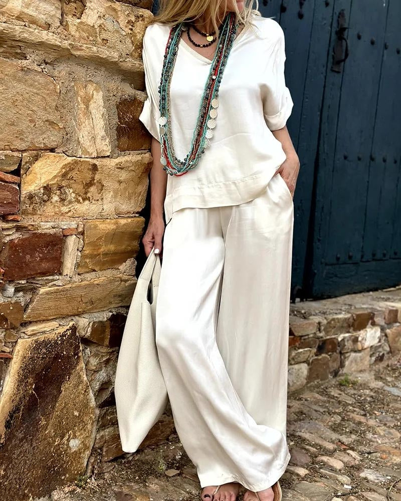 Heidi-Mode | Elegantes Weißes V-Ausschnitt Top & Weitbeinige Hose Set