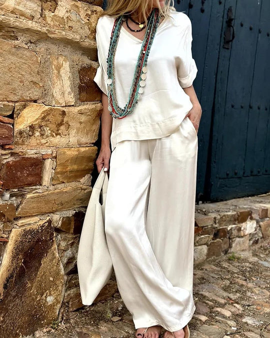 Heidi-Mode | Elegantes Weißes V-Ausschnitt Top & Weitbeinige Hose Set