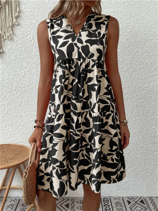 Heidi-Mode | Stilvolle Damenkleid mit Blattmotiv für Den Sommer