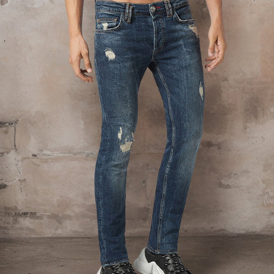 Stretch-Jeans mit gerissenen Kanten in schmaler Passform