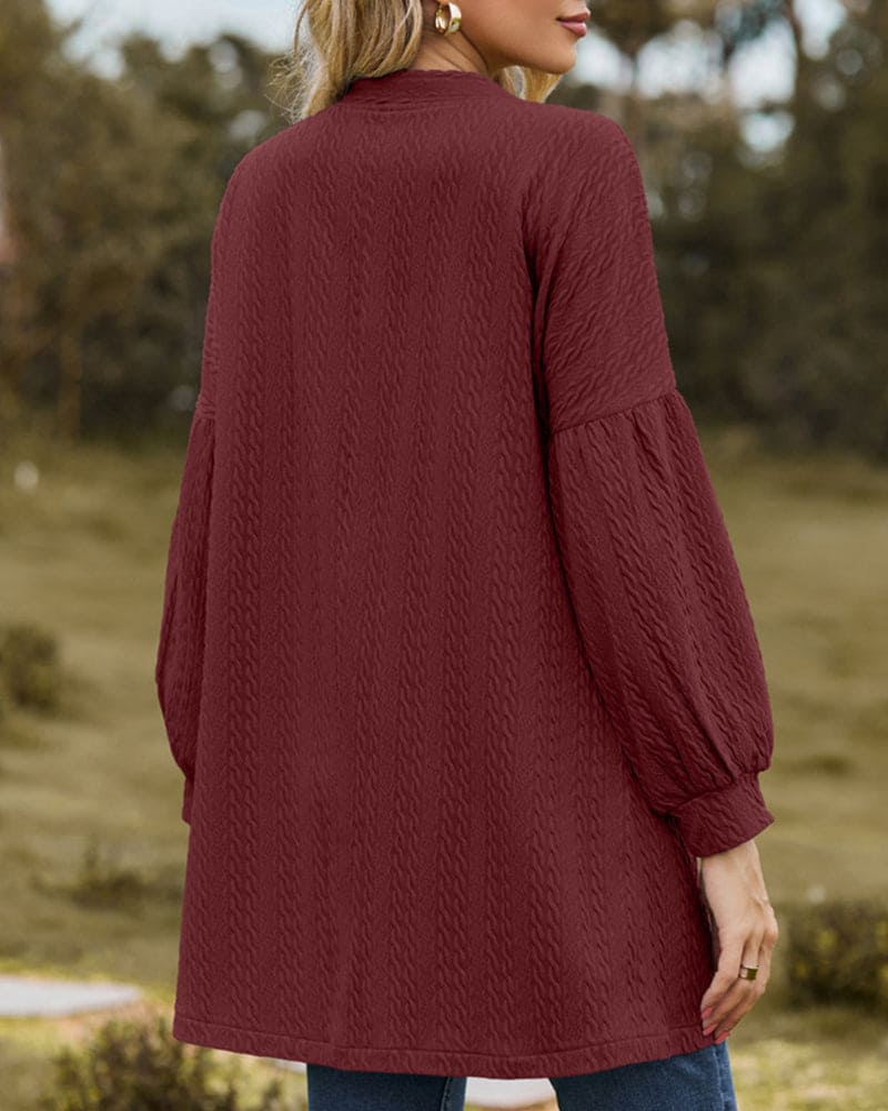 stilvolle strukturierte Strickjacke mit Laternenärmeln