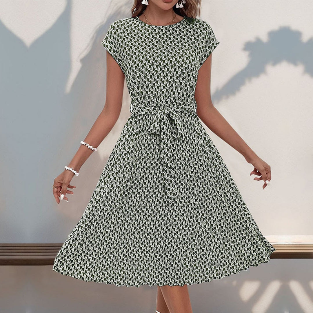 Heidi Mode | Plissee-Kleid mit geometrischem Print