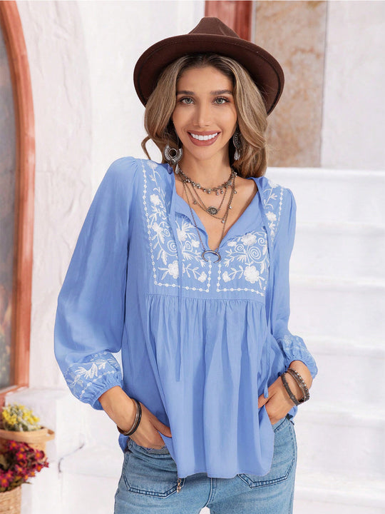 Heidi-Mode | Florale Bindekragen Bluse mit Ballonärmeln