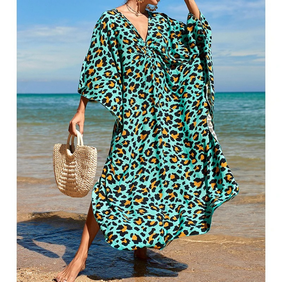 Blauw bedrukte strandjurk met V-hals