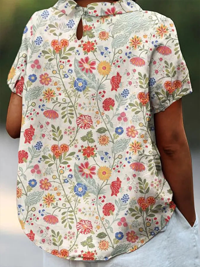 Heidi-Mode | Kurzarm Bluse mit floralem Muster und Kragen