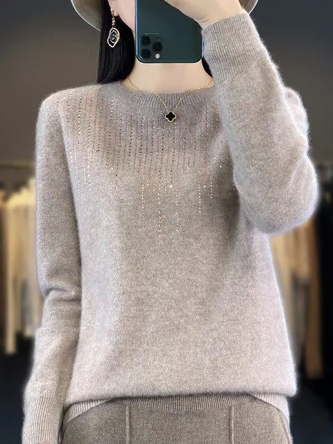 Glänzender Pullover